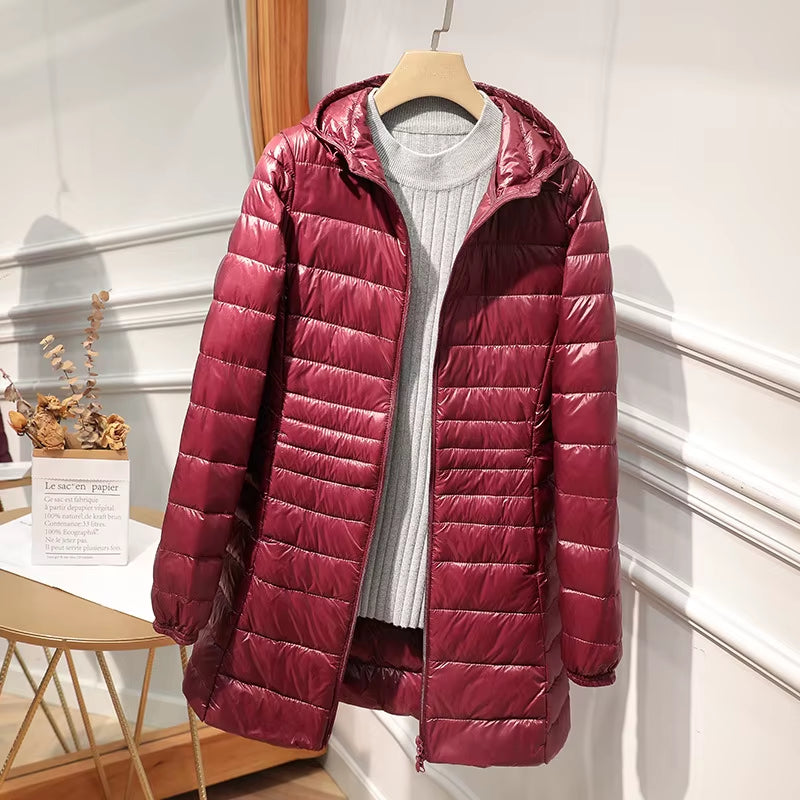 Female Long Warm down Coat with Portable Storage Bag Women Light down Jacket Ladies Overcoats Hip-Length High Street